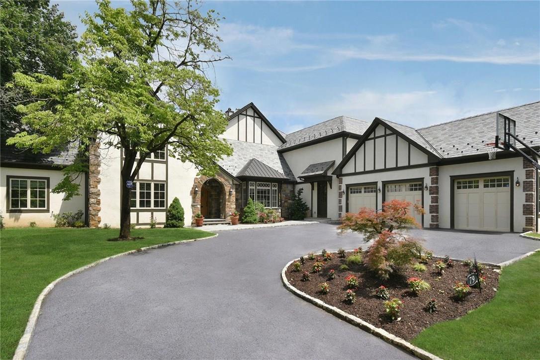 79 Oxford Road New Rochelle, NY 10804 - Photo 1 of 1 front view of a house with a yard