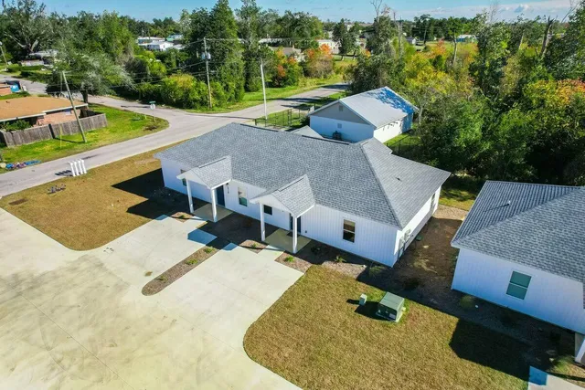 aerial view of a house with a swimming pool