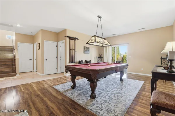 a view of a livingroom with furniture and a table