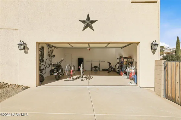a view of a living room with gym equipment