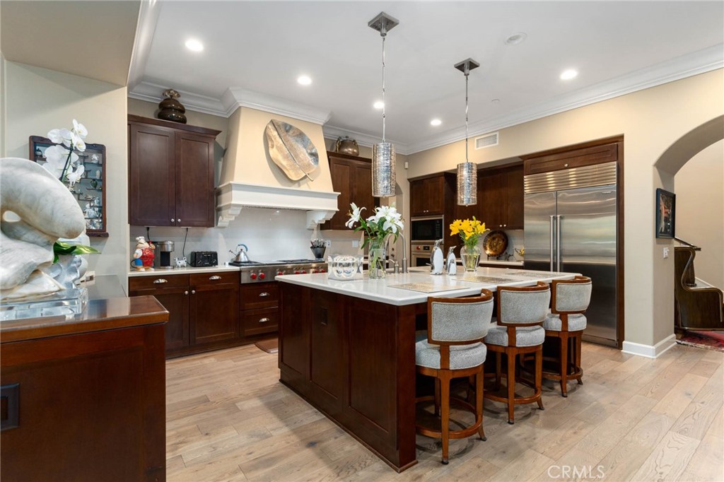 7 Zephyr Irvine, CA 92602 - Photo 13 of 52 a kitchen with lots of counter space and breakfast area