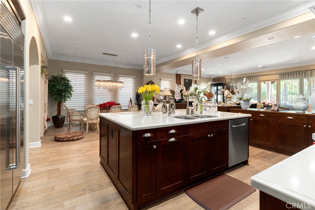 7 Zephyr Irvine, CA 92602 - Photo 17 of 52 a kitchen with a sink and cabinets