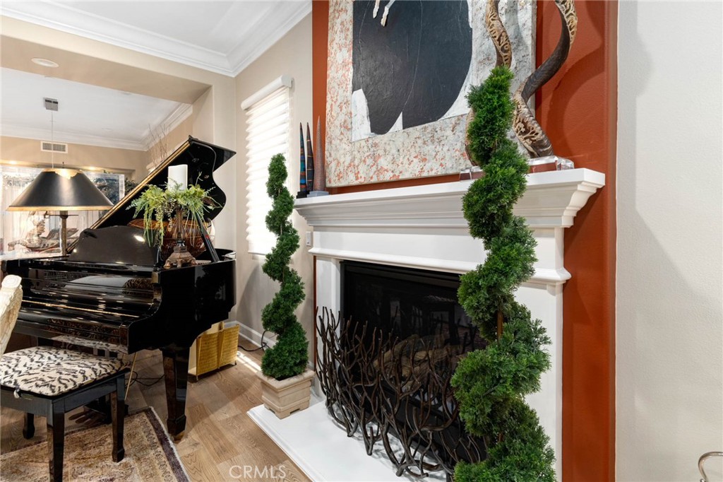7 Zephyr Irvine, CA 92602 - Photo 19 of 52 a living room with furniture and a fireplace
