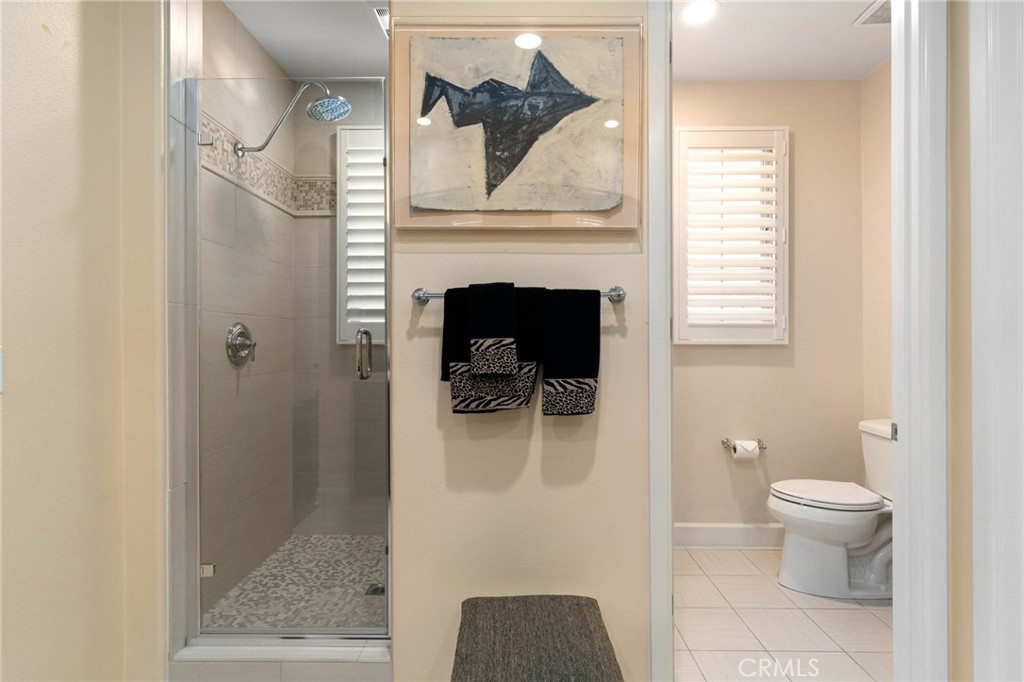 7 Zephyr Irvine, CA 92602 - Photo 24 of 52 a bathroom with a toilet and a mirror