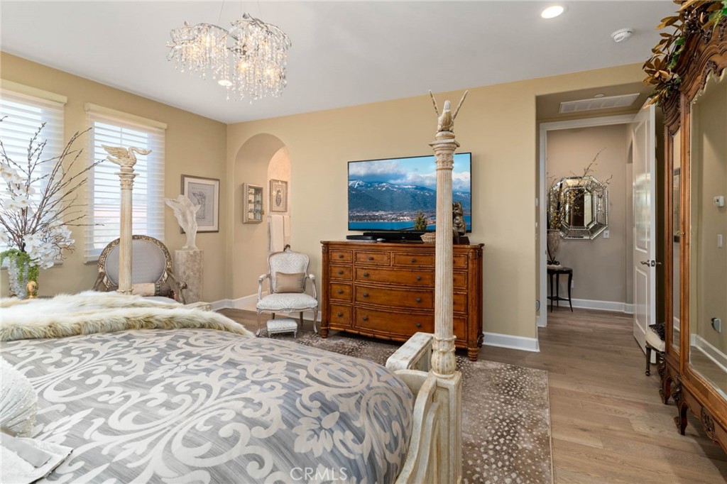 7 Zephyr Irvine, CA 92602 - Photo 36 of 52 a bedroom with a bed and a flat screen tv