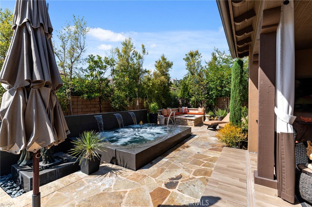 7 Zephyr Irvine, CA 92602 - Photo 42 of 52 a view of a backyard with sitting area