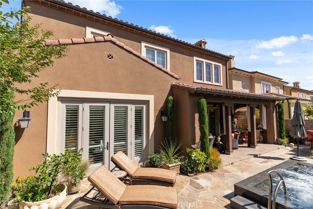 7 Zephyr Irvine, CA 92602 - Photo 46 of 52 a view of a house with a patio