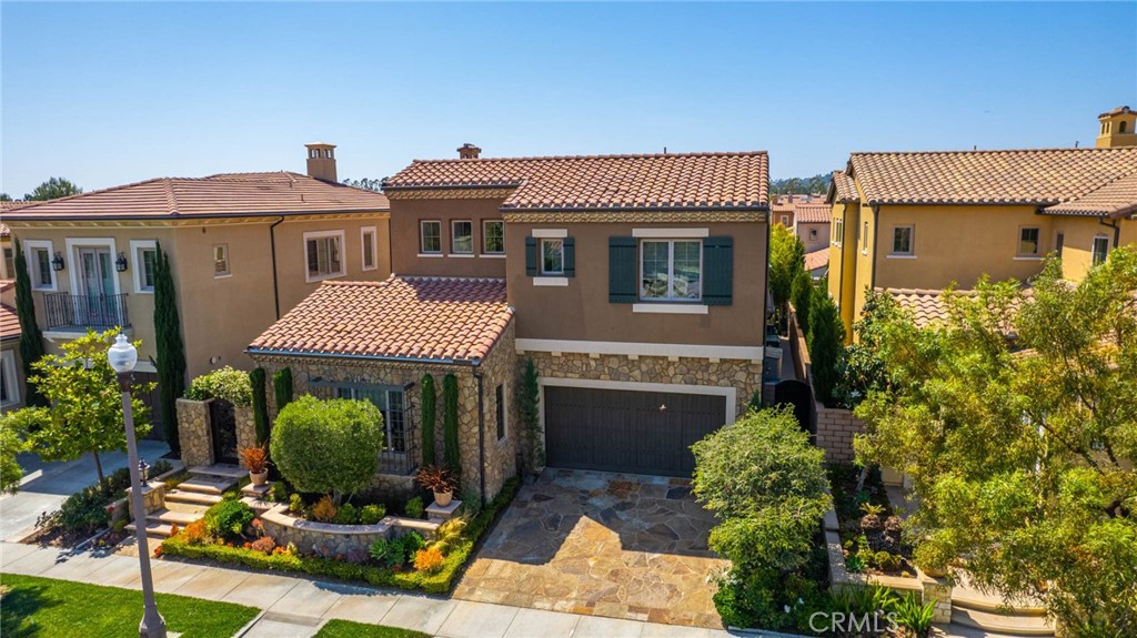 7 Zephyr Irvine, CA 92602 - Photo 52 of 52 a front view of a house with a yard