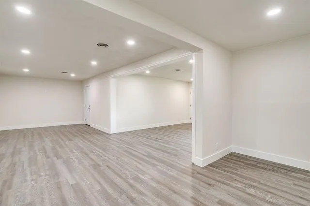 a bathroom with a sink and a window