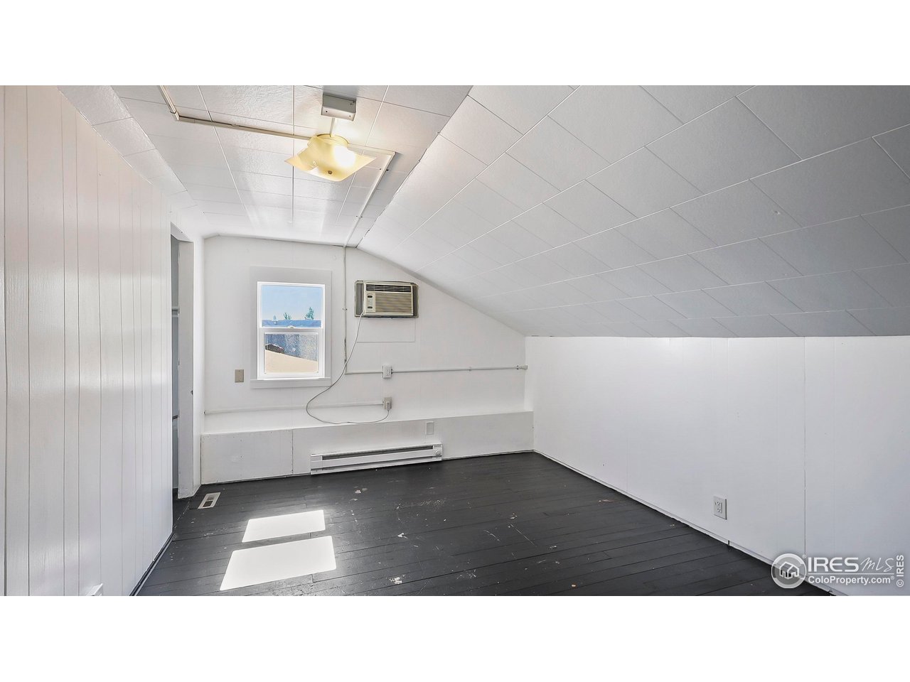1408 Edison Street Brush, CO 80723 - Photo 16 of 23 a black and white photo of a living room