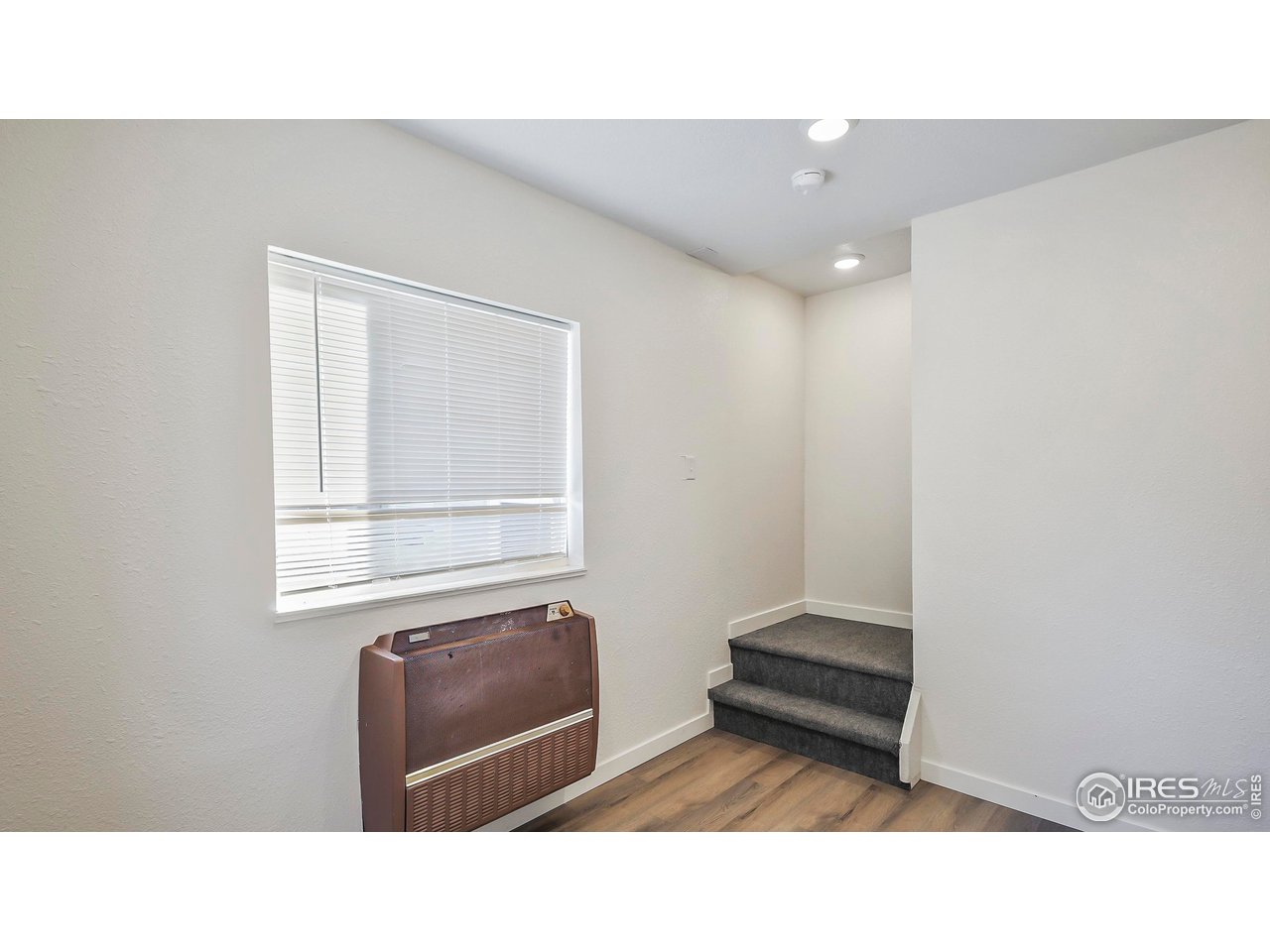 1408 Edison Street Brush, CO 80723 - Photo 17 of 23 a black and white photo of a living room