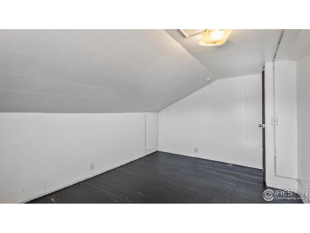 1408 Edison Street Brush, CO 80723 - Photo 18 of 23 a black and white photo of a room