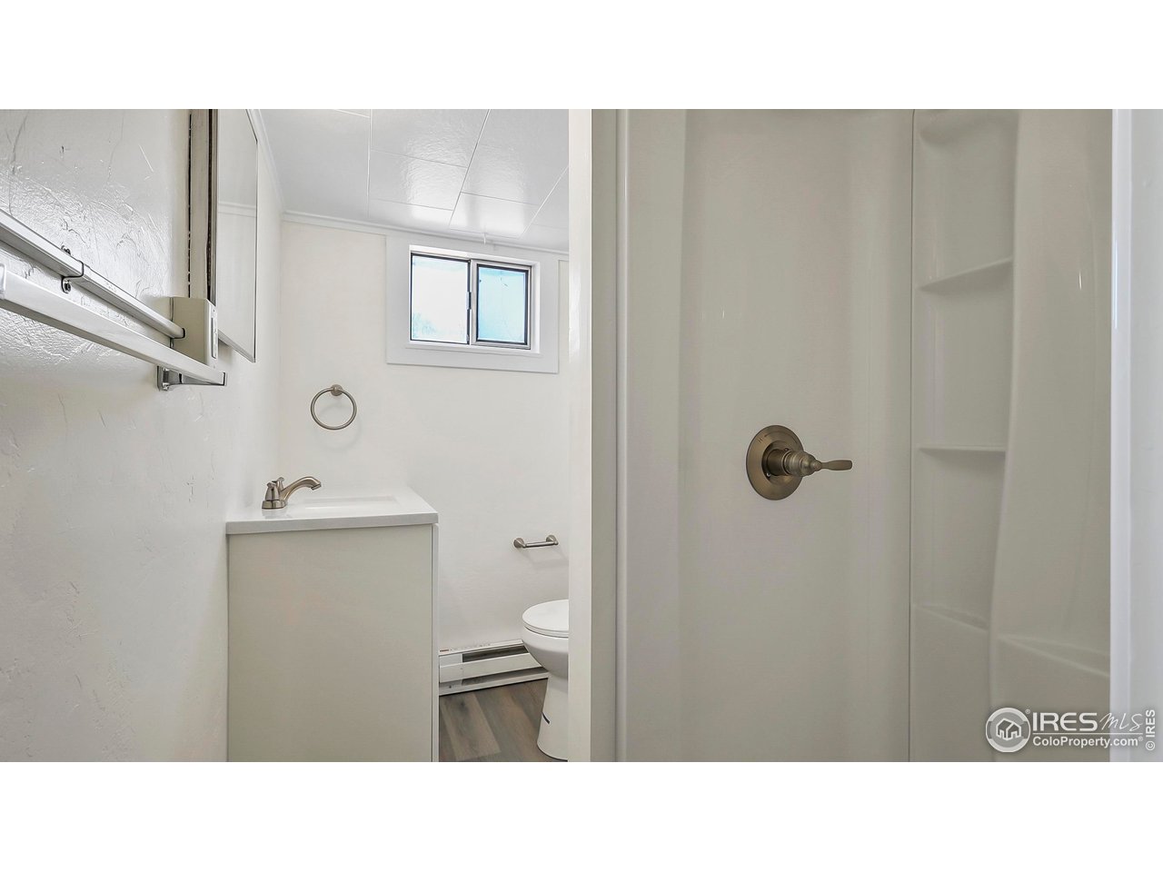 1408 Edison Street Brush, CO 80723 - Photo 19 of 23 a black and white photo of a bathroom