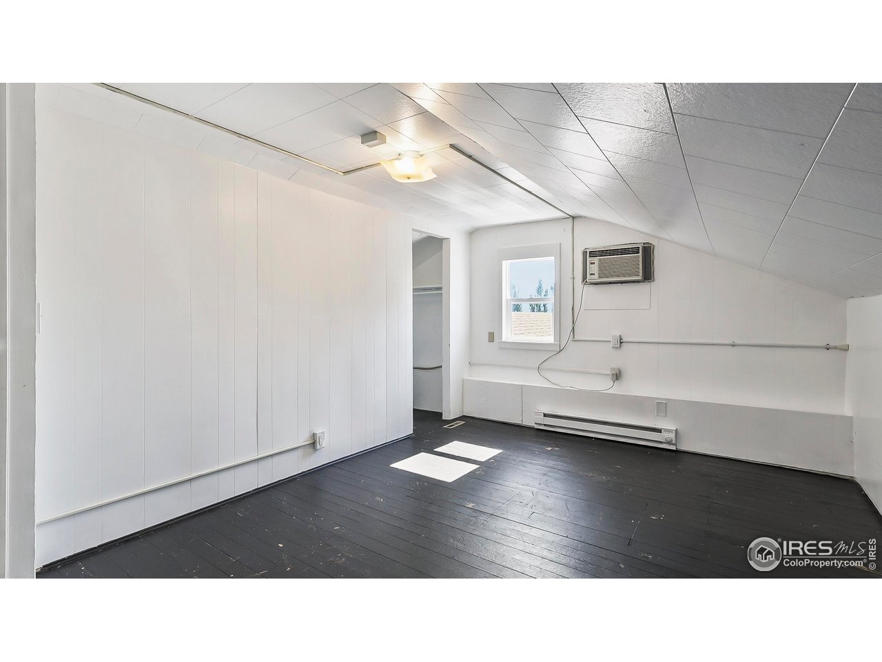 1408 Edison Street Brush, CO 80723 - Photo 20 of 23 a black and white photo of a living room
