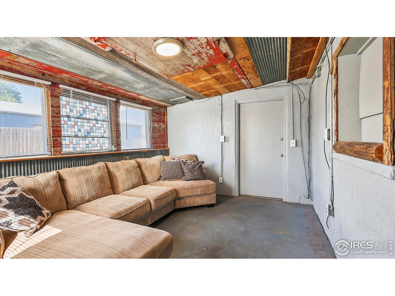 1408 Edison Street Brush, CO 80723 - Photo 9 of 23 a black and white photo of a living room