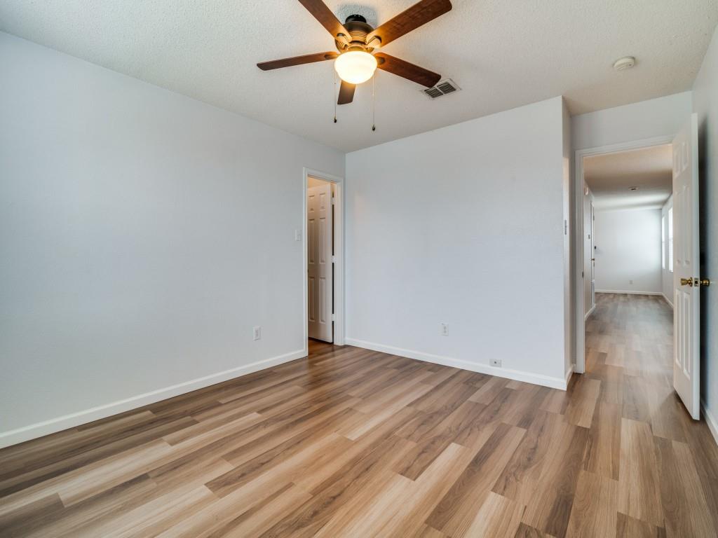 3100 Misty Ridge Lane Rockwall, TX 75032 - Photo 24 of 25 a view of empty room with wooden floor and fan