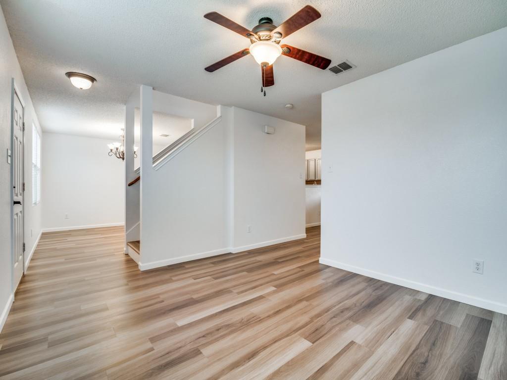 3100 Misty Ridge Lane Rockwall, TX 75032 - Photo 25 of 25 wooden floor in an empty room with a fan