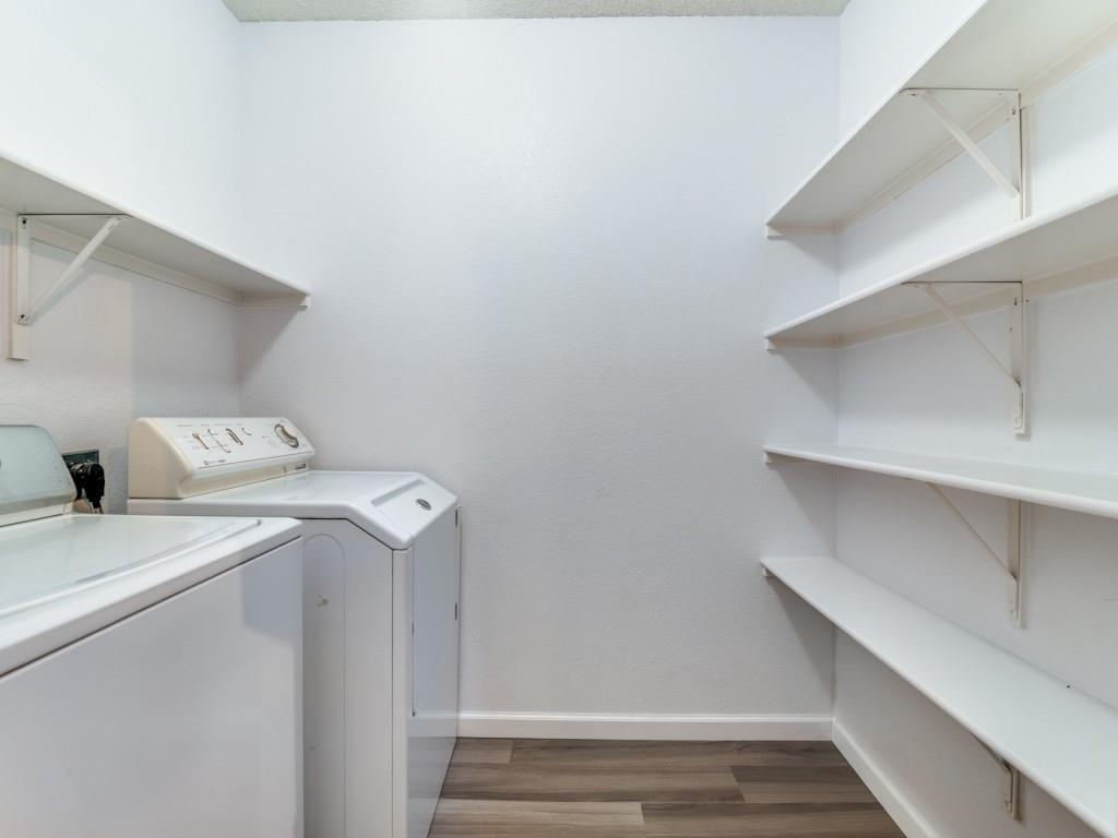 3100 Misty Ridge Lane Rockwall, TX 75032 - Photo 10 of 25 a utility room with dryer and washer