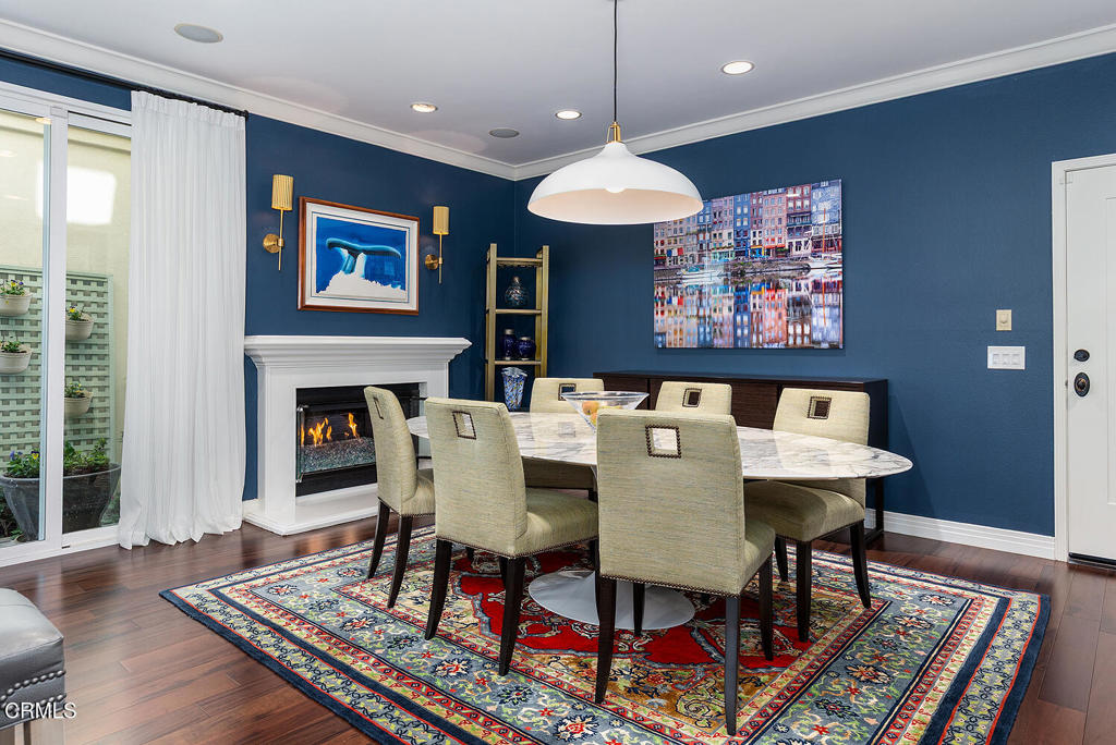 411 22nd Street Huntington Beach, CA 92648 - Photo 17 of 38 a view of a dining room with furniture window and wooden floor