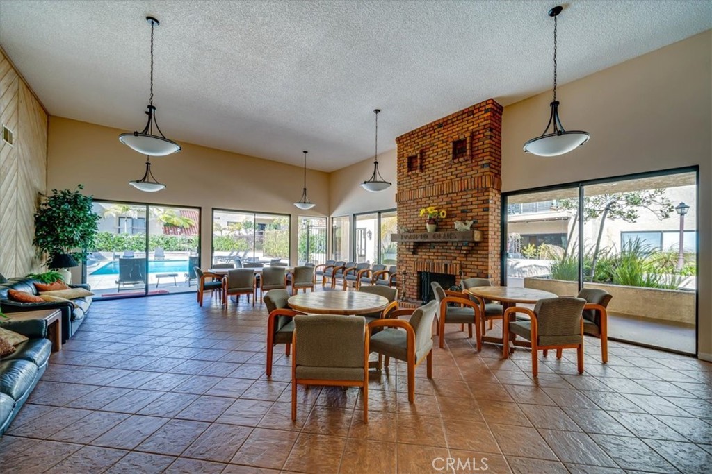 8180 Manitoba Street, Unit 302 Playa del Rey, CA 90293 - Photo 23 of 31 a view of a dining room with furniture window and outside view