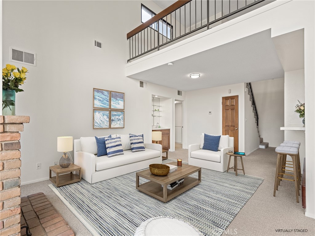8180 Manitoba Street, Unit 302 Playa del Rey, CA 90293 - Photo 3 of 31 a living room with furniture and wooden floor