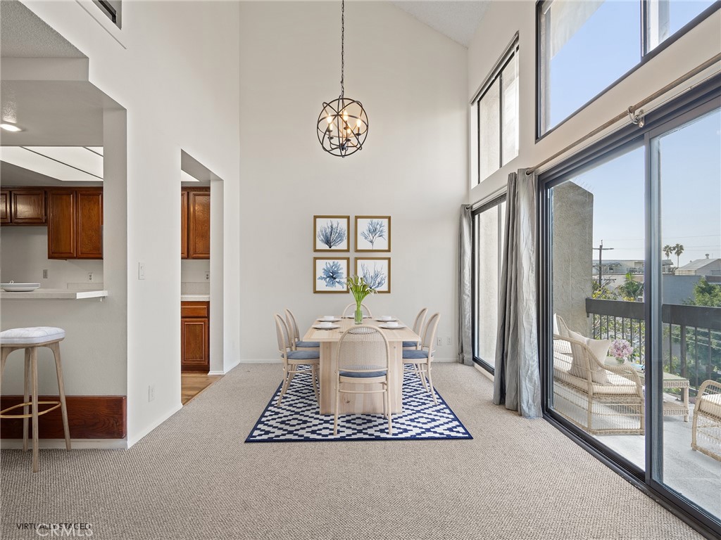 8180 Manitoba Street, Unit 302 Playa del Rey, CA 90293 - Photo 5 of 31 a view of dining room and livingroom with furniture