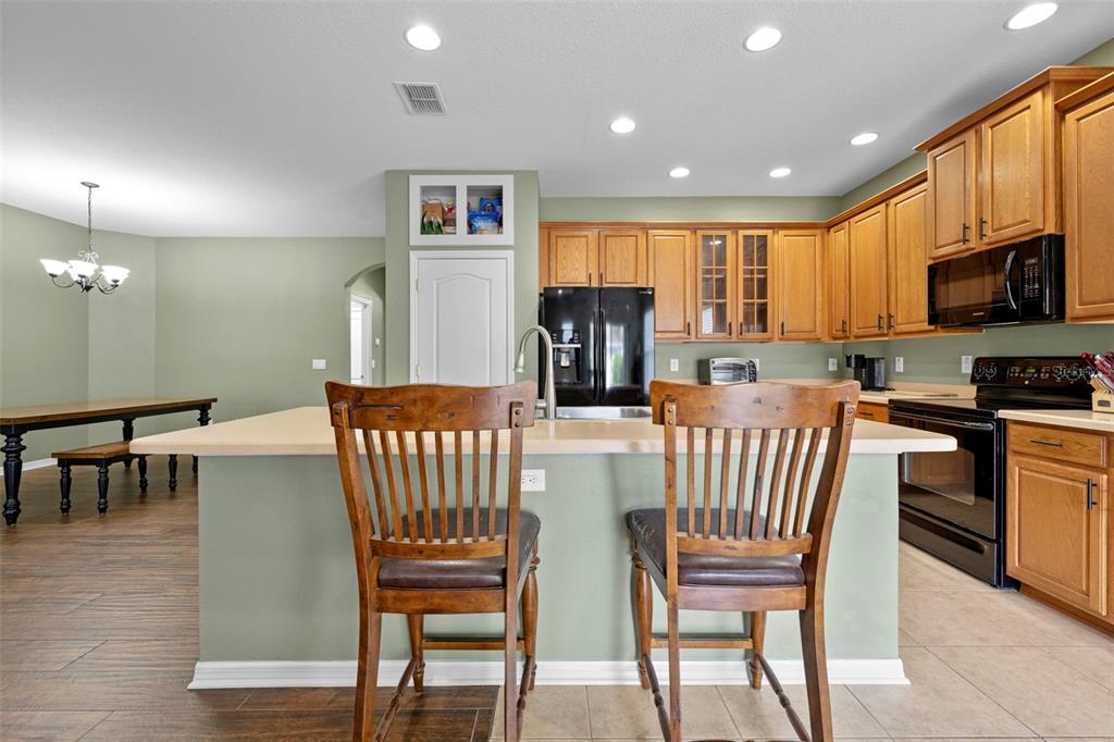 632 Winthrop Drive Spring Hill, FL 34609 - Photo 18 of 49 a view of a dining room with furniture