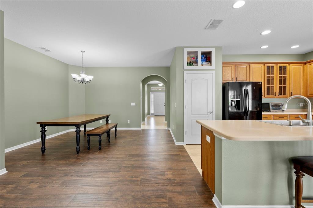 632 Winthrop Drive Spring Hill, FL 34609 - Photo 7 of 49 a view of a livingroom with furniture window and wooden floor