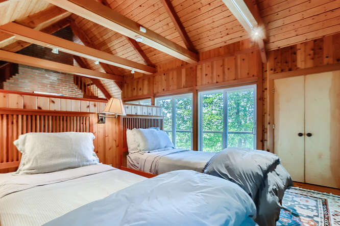 14 Ephriam Allen Road West Tisbury, MA 02568 - Photo 10 of 17 a bed room with a bed and a large window
