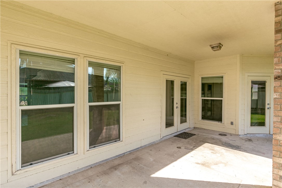 8209 Tango Circle Corpus Christi, TX 78414 - Photo 26 of 28 front view of a house with a porch