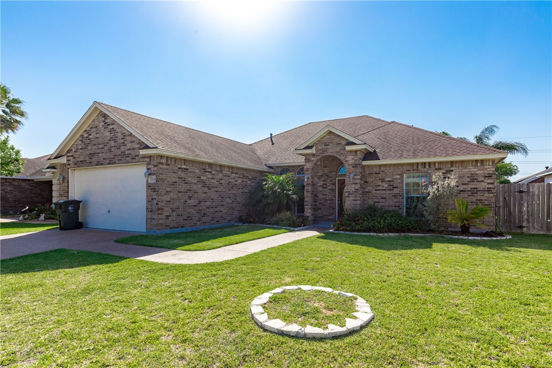 8209 Tango Circle Corpus Christi, TX 78414 - Photo 28 of 28 a view of a house with a backyard and a tree
