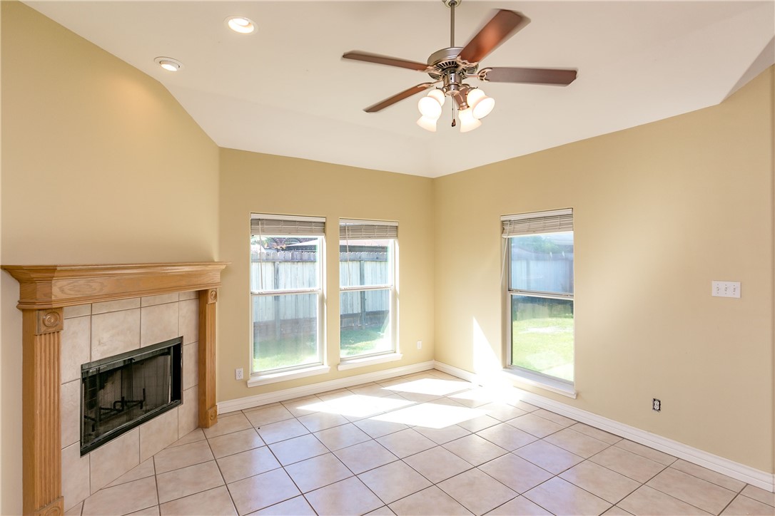 8209 Tango Circle Corpus Christi, TX 78414 - Photo 3 of 28 a view of an empty room with a fireplace
