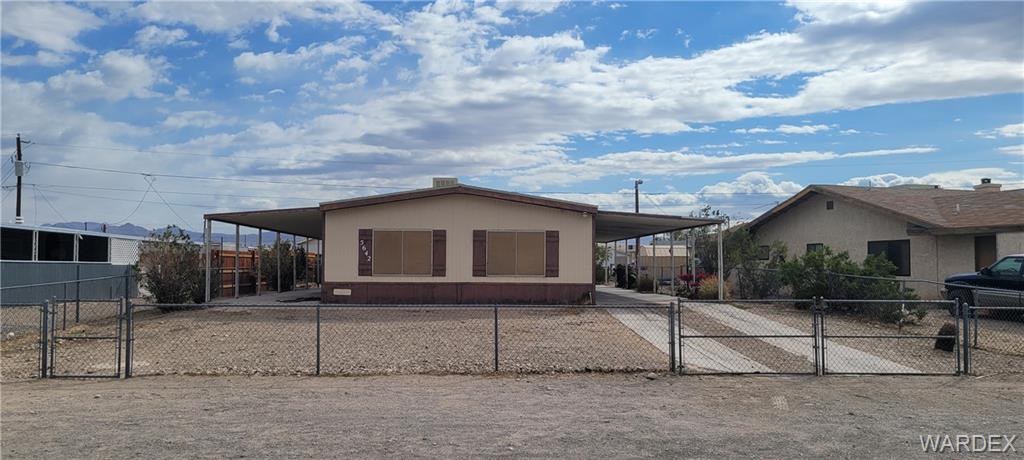 5642 Rocky Road Fort Mohave, AZ 86426 - Photo 1 of 27 a house view with a backyard space