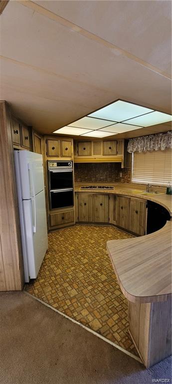 5642 Rocky Road Fort Mohave, AZ 86426 - Photo 16 of 27 a room with a bed and a refrigerator