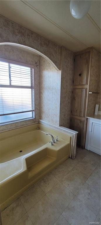 5642 Rocky Road Fort Mohave, AZ 86426 - Photo 9 of 27 a spacious bathroom with a bathtub and a shower