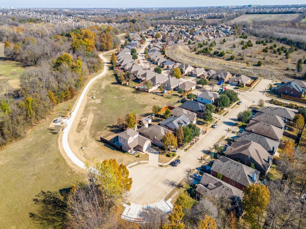 2313 Luscombe Lane Anna, TX 75409 - Photo 28 of 30 an aerial view of a house with a lake view