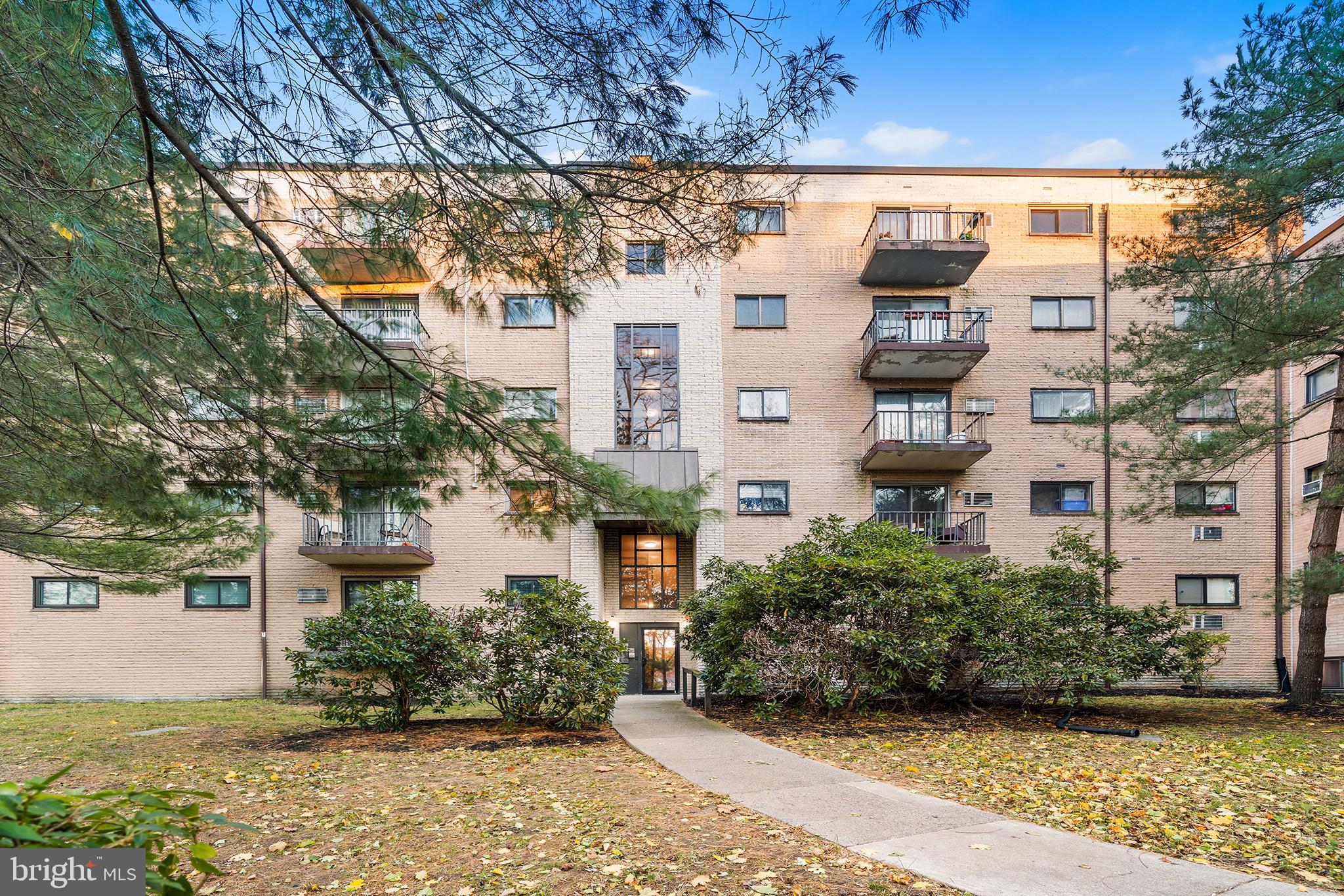 a view of a building with a garden