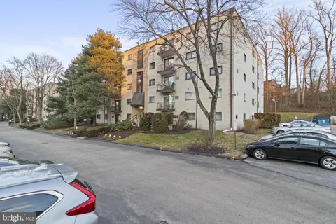 a car parked in front of a house