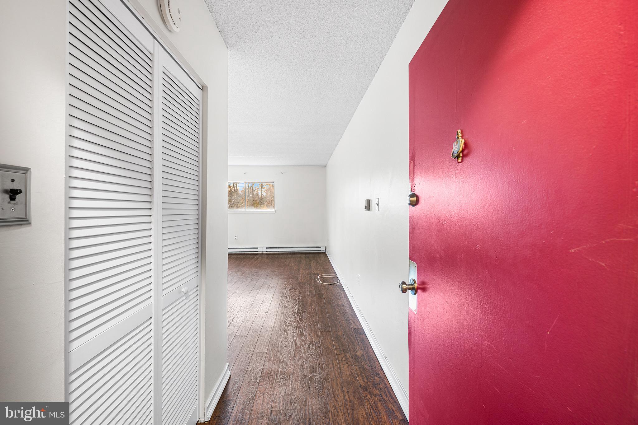 400 Glendale Road, Unit K52 Havertown, PA 19083 - Photo 4 of 18 a view of a hallway with wooden floor