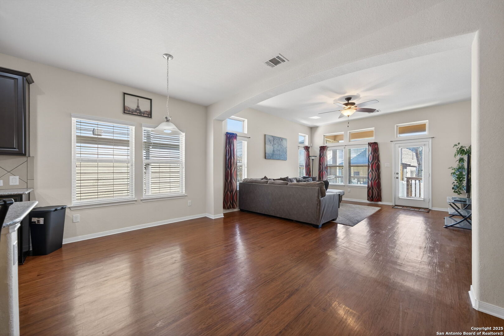147 Brook View Cibolo, TX 78108 - Photo 13 of 29 a view of a livingroom with furniture wooden floor and windows