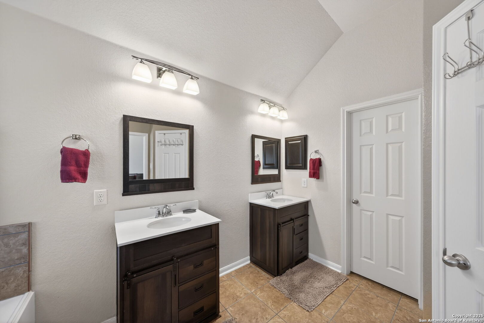 147 Brook View Cibolo, TX 78108 - Photo 17 of 29 a spacious bathroom with a sink vanity and mirror