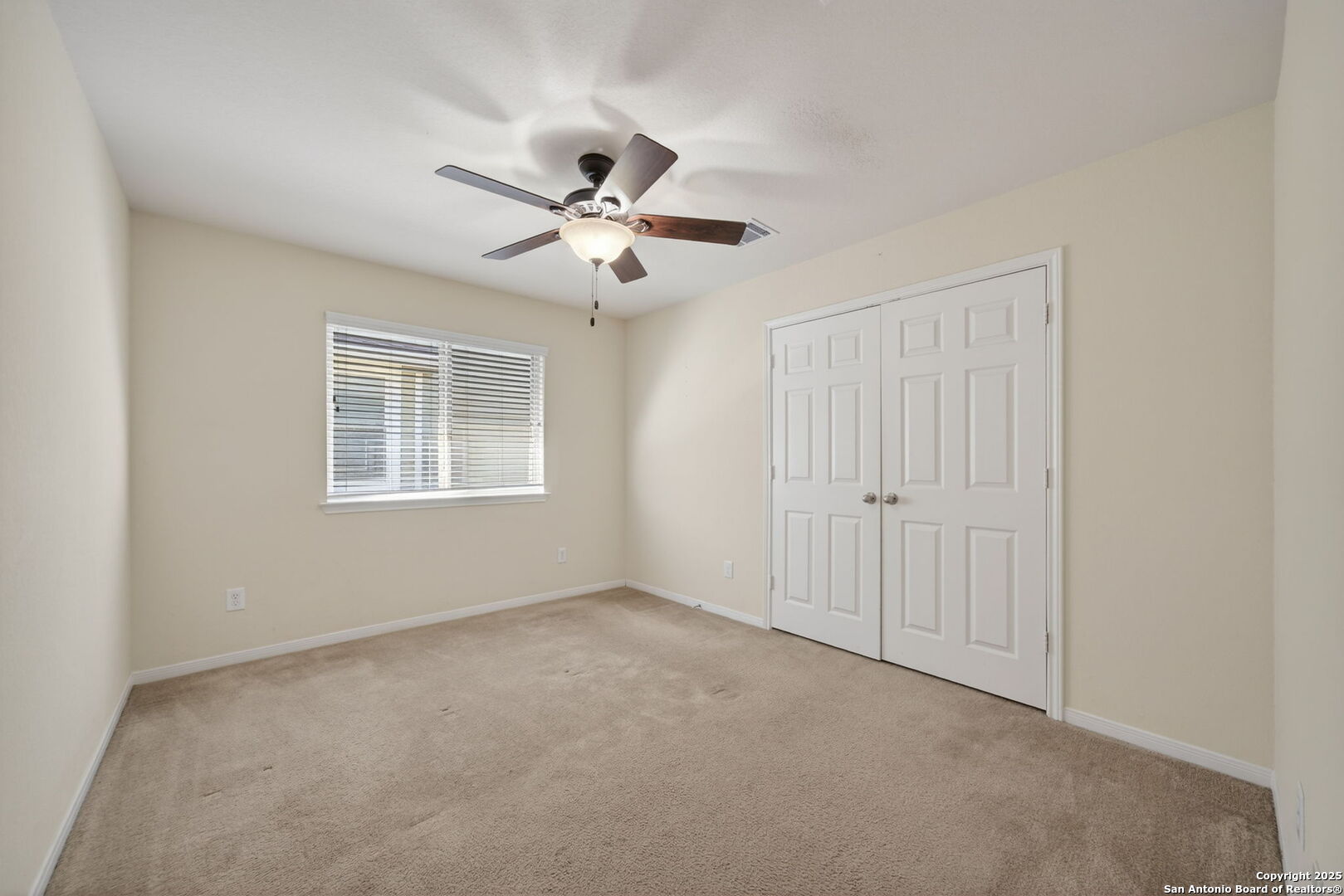 147 Brook View Cibolo, TX 78108 - Photo 19 of 29 a view of an empty room with a window