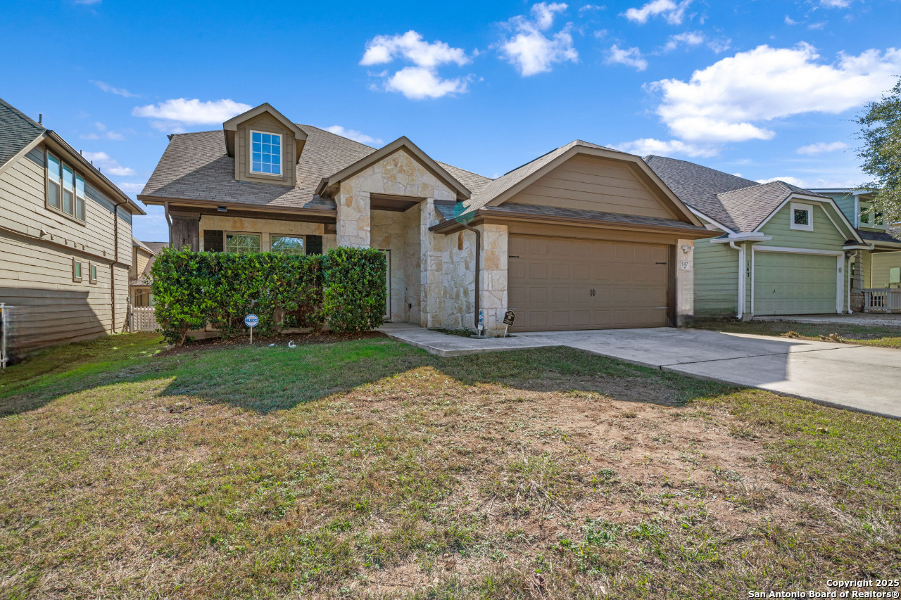 147 Brook View Cibolo, TX 78108 - Photo 2 of 29 a front view of a house with a yard