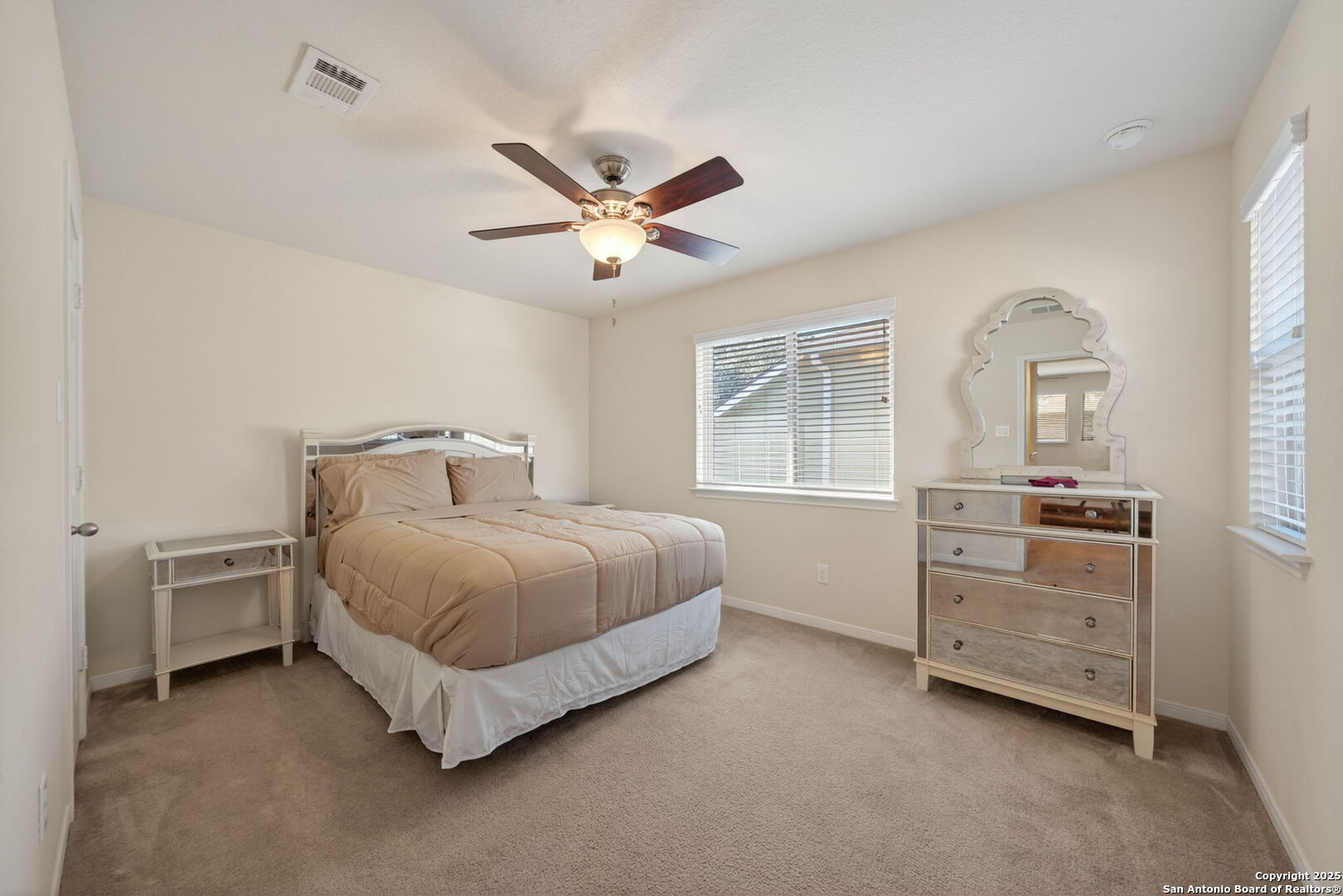 147 Brook View Cibolo, TX 78108 - Photo 22 of 29 a bedroom with a bed and a window