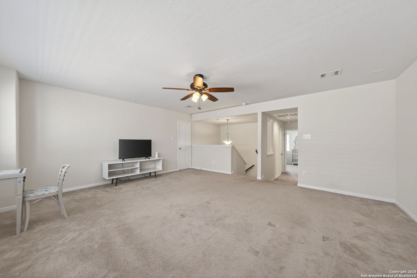 147 Brook View Cibolo, TX 78108 - Photo 25 of 29 a view of livingroom with furniture and chandelier fan