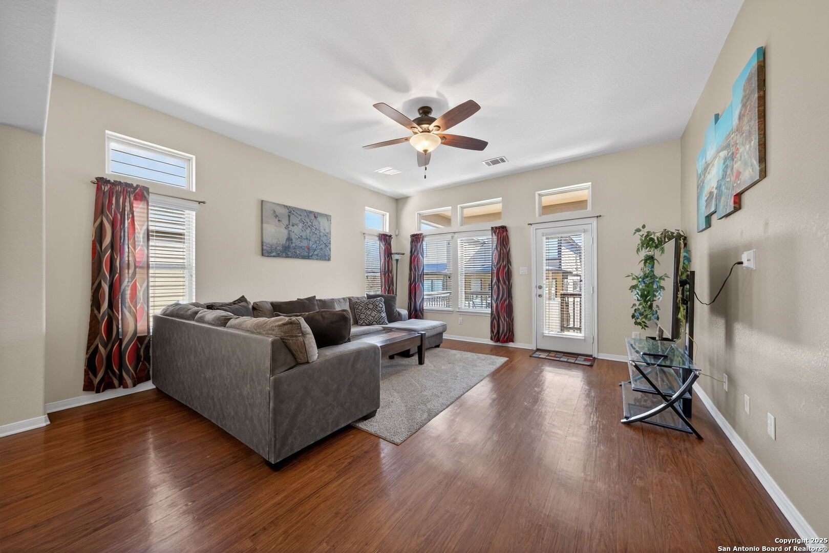 147 Brook View Cibolo, TX 78108 - Photo 7 of 29 a living room with furniture and a flat screen tv
