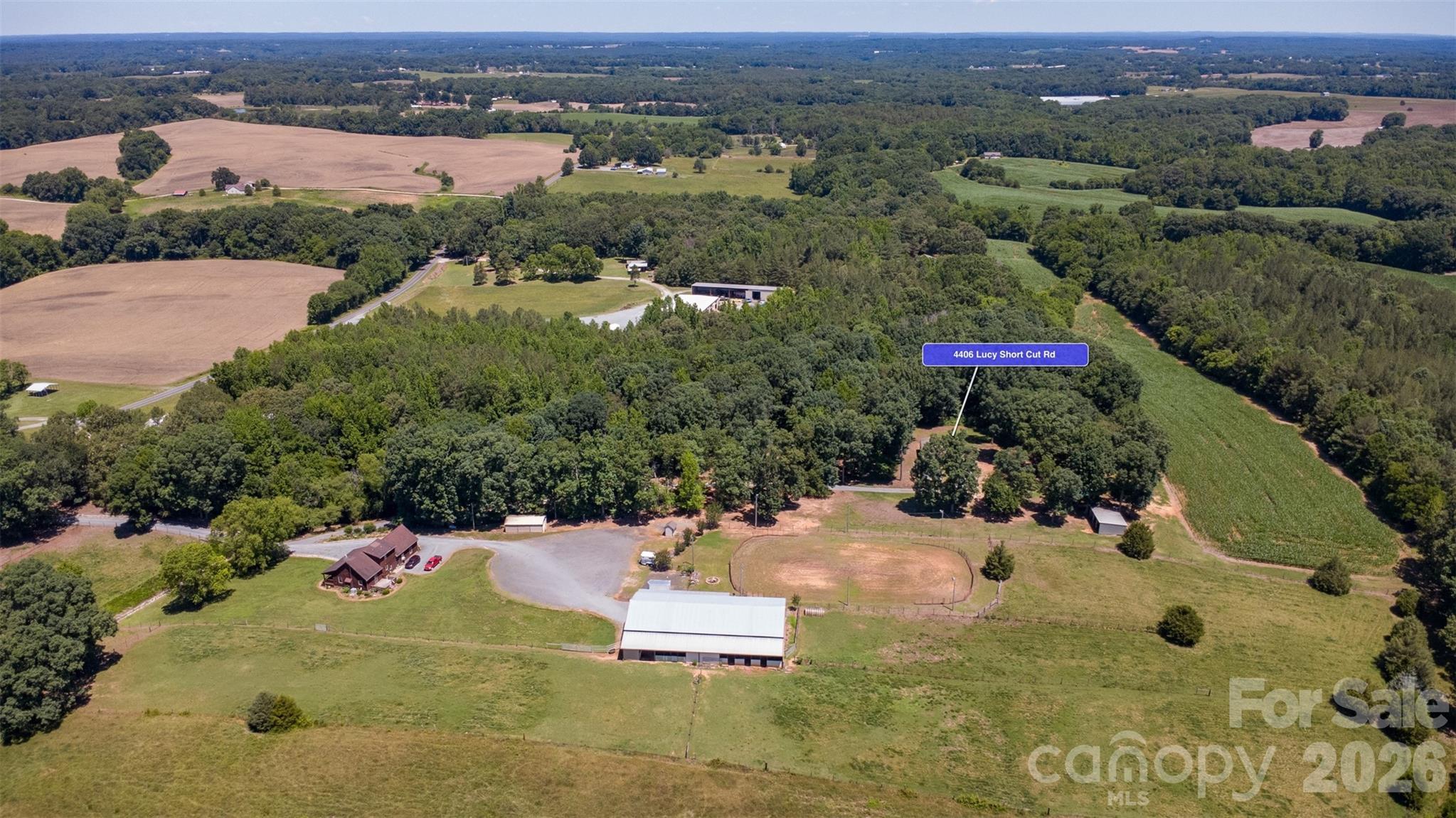 4406 Lucy Short Cut Road Marshville, NC 28103 - Photo 26 of 30 an aerial view of a house with a yard