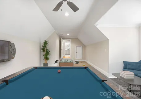 a living room with a couch and a stove
