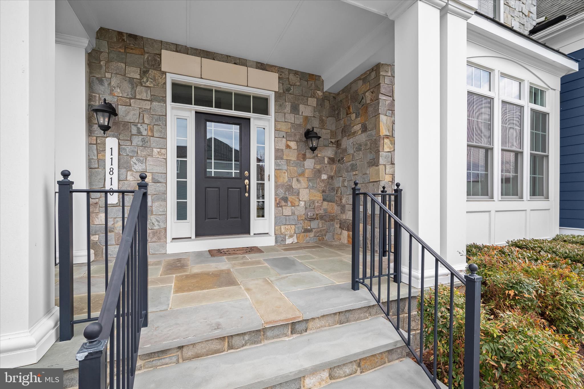 11810 Federal Street Fulton, MD 20759 - Photo 4 of 9 a view of a brick house with glass door