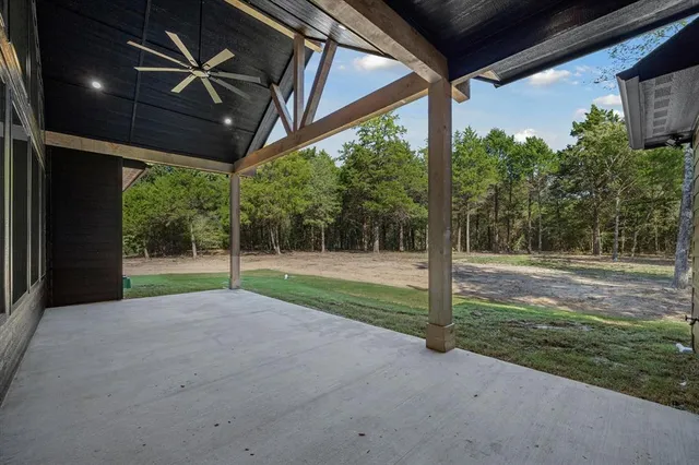 a view of backyard with green space